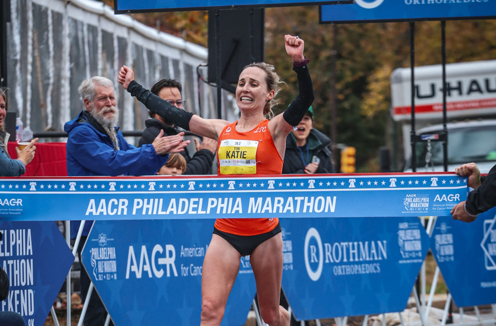 Katie Florio runs to the finish line at the 2024 Philadelphia Marathon.